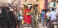 A poor rickshaw driver and womens are sitting in Varanasi city crowded city Royalty Free Stock Photo